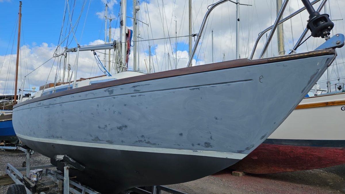 Black Bess faired and primed in grey, filler spots sanded flush