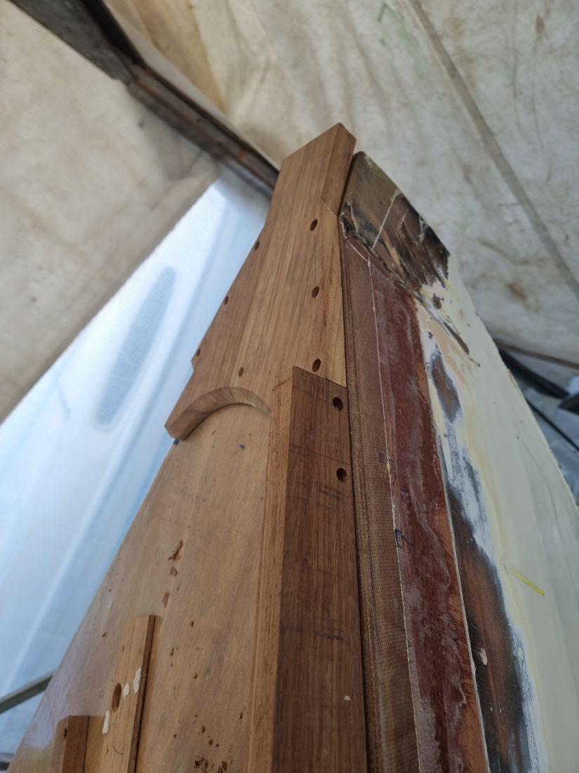 Looking forward along the new oak covering boards to the stem head