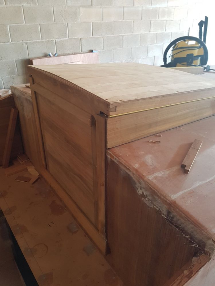 New curved sliding hatch and framed companionway built in hardwood on a cabin top