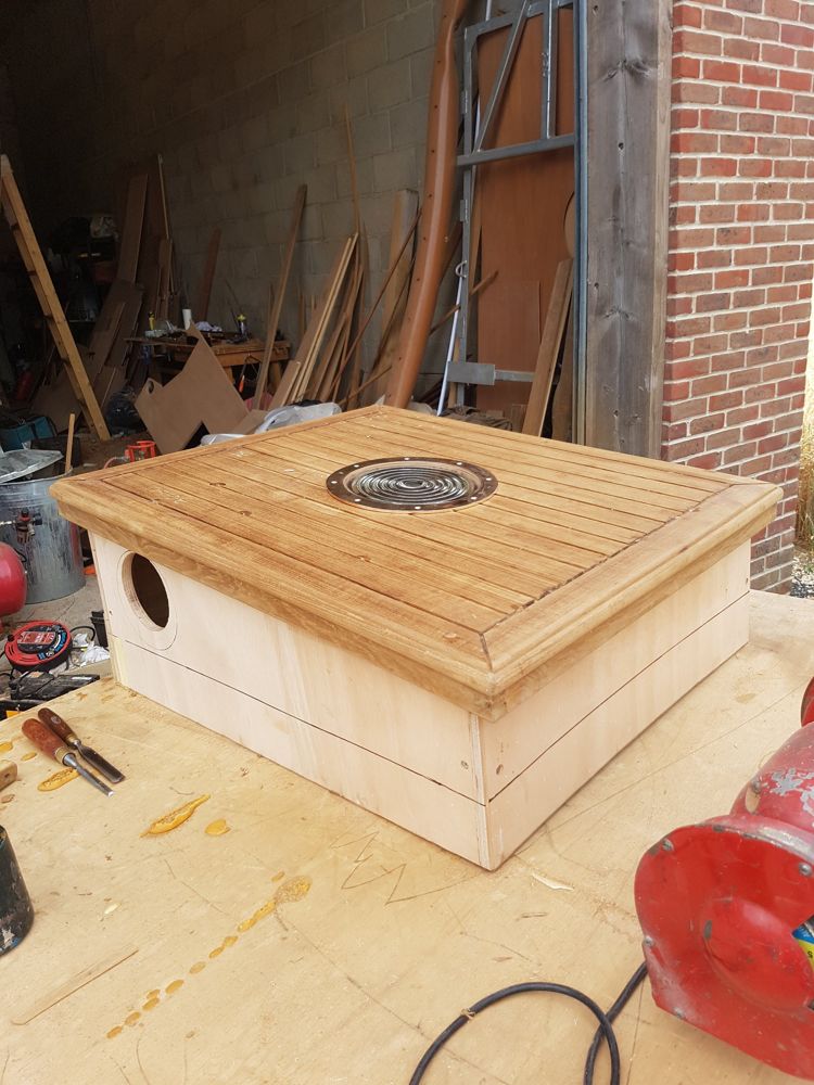 Hardwood deck hatch with a laid top, moulded edge and prism deck light
