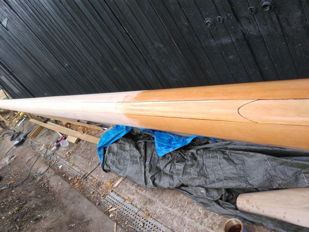 First coat of varnish going onto the finished mast, bringing out the grain