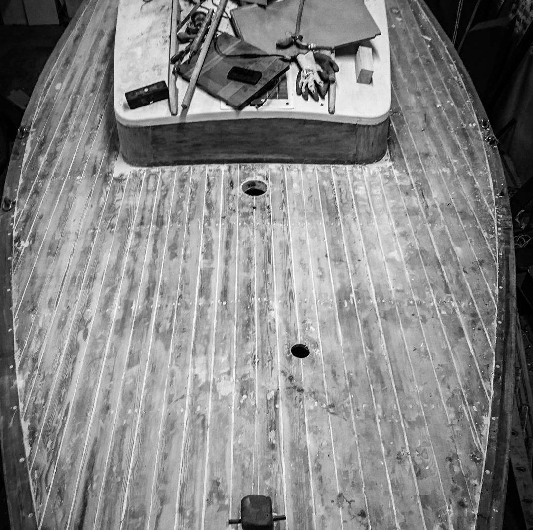 Petrina's laid deck and coachroof seen from above, stripped and awaiting restoration