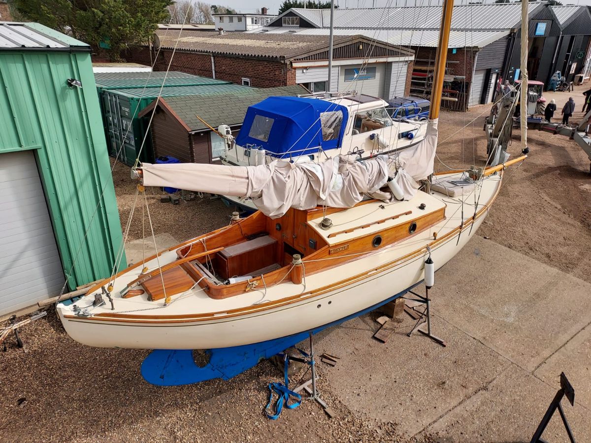 Roamer ashore seen from above, showing her new cockpit, decks, varnished coachroof and cream topsides